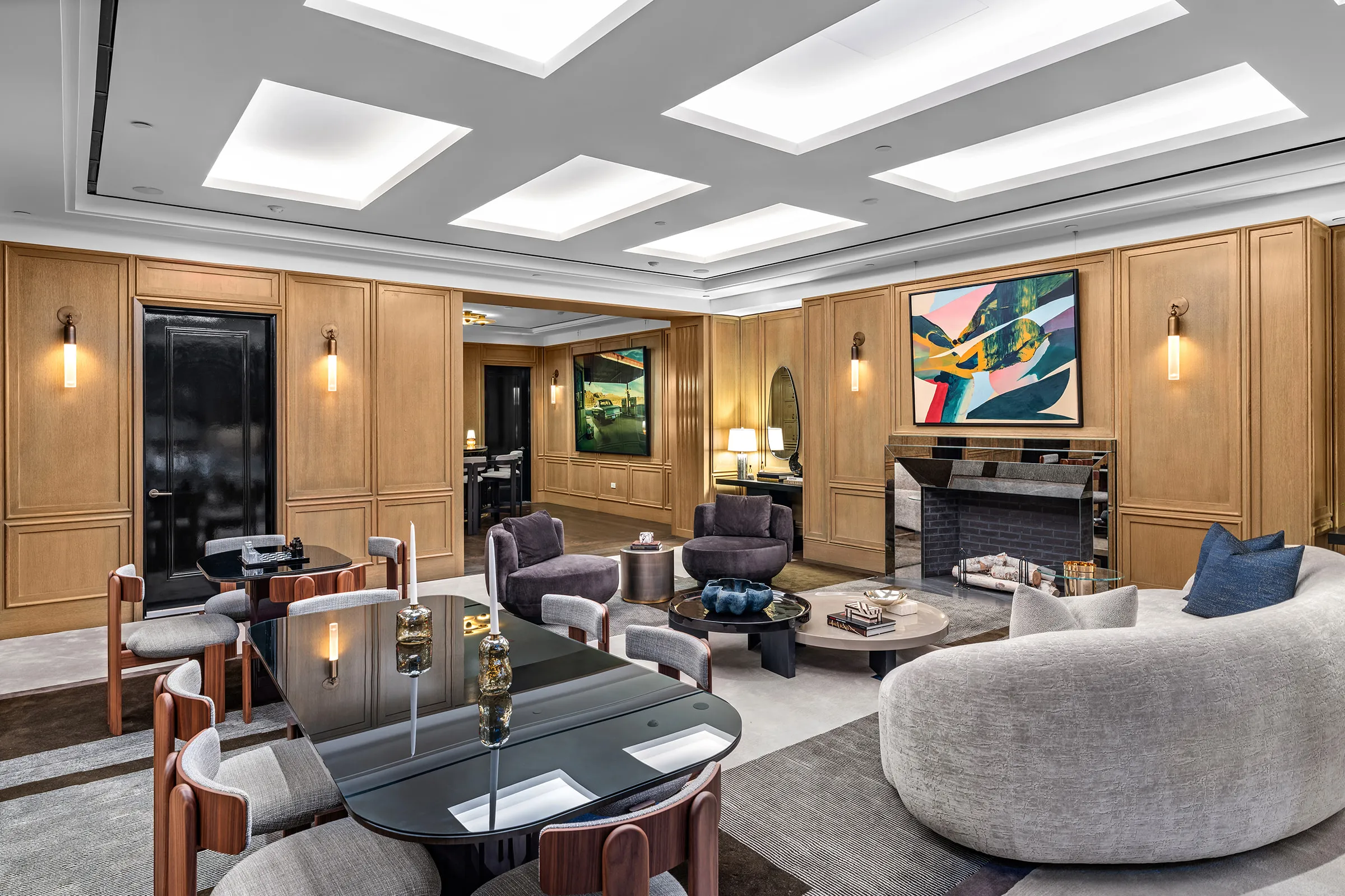 Amenity lounge at Sixteen Fifth Avenue for Madison Realty Capital — oak panelling, coffered ceiling and custom furniture